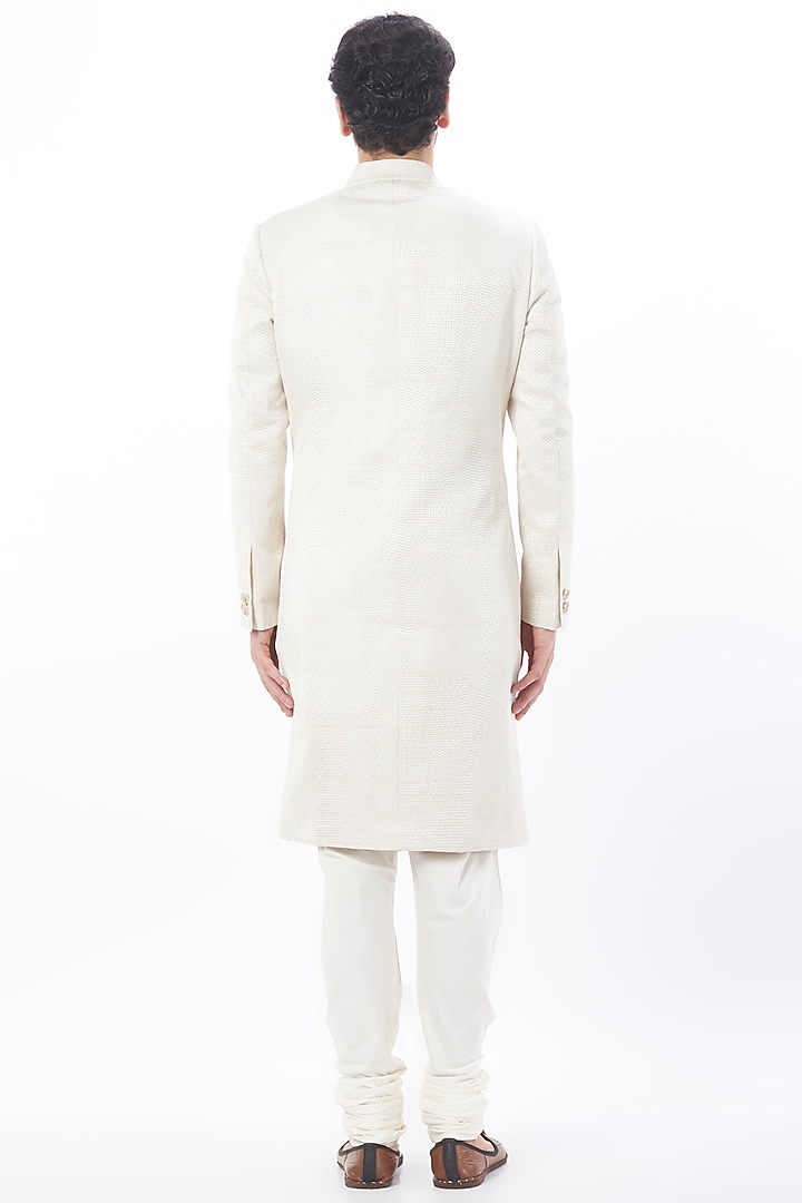 Ivory Raw Silk Groom Sherwani Set by Divyam Mehta Men at Pernia's Pop Up Shop