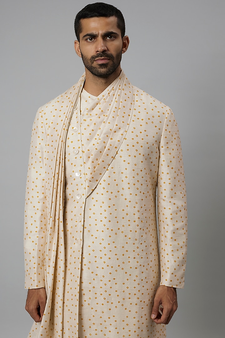 Beige Raw Silk & Stretch Cotton Bandhani Draped Kurta Set by Divyam Mehta Men at Pernia's Pop Up Shop