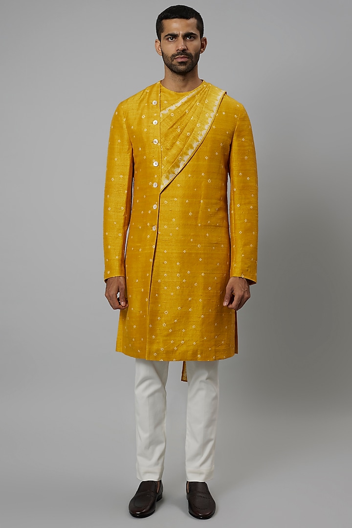 Haldi Yellow Raw Silk & Stretch Cotton Bandhani Draped Kurta Set by Divyam Mehta Men
