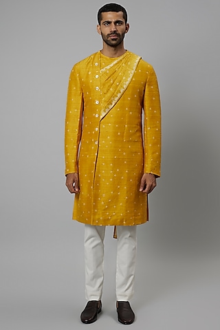 Haldi Yellow Raw Silk & Stretch Cotton Bandhani Draped Kurta Set by Divyam Mehta Men