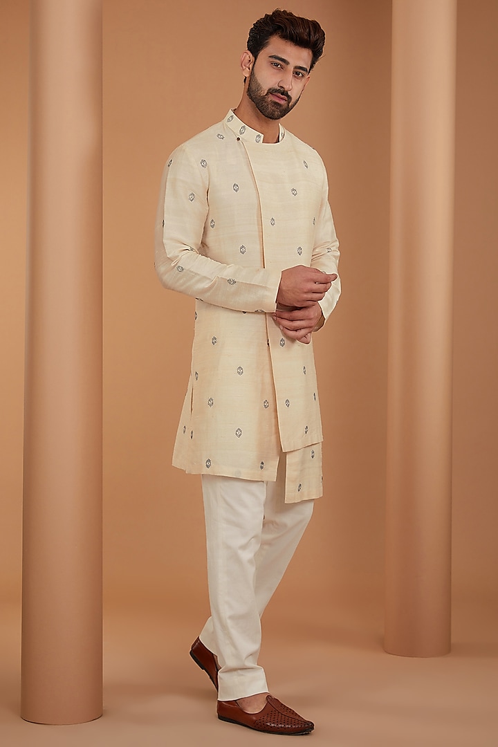 Beige Raw Silk & Stretch Cotton Bandhani Kurta Set by Divyam Mehta Men