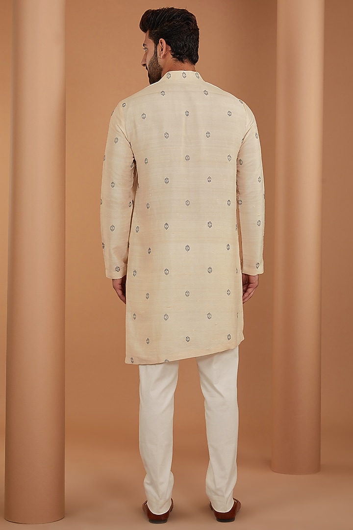 Beige Raw Silk & Stretch Cotton Bandhani Kurta Set by Divyam Mehta Men at Pernia's Pop Up Shop