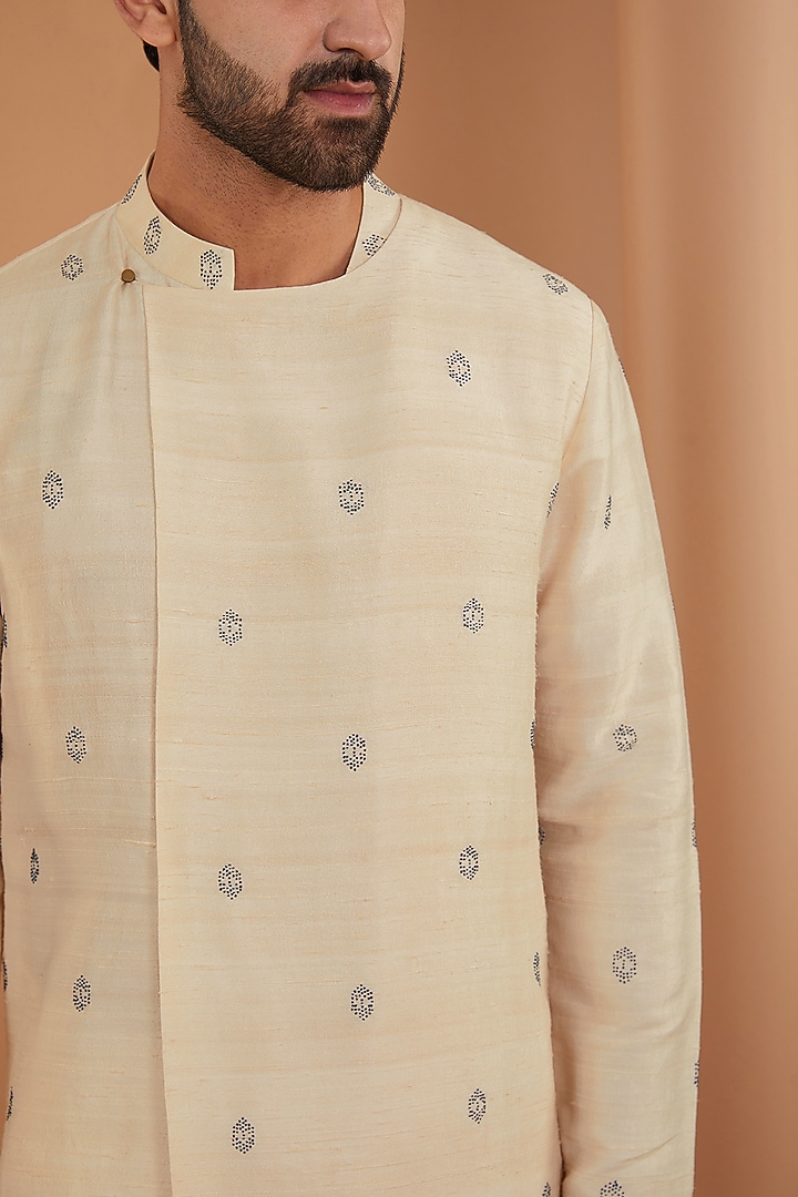 Beige Raw Silk & Stretch Cotton Bandhani Kurta Set by Divyam Mehta Men at Pernia's Pop Up Shop