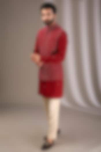 Red Raw Silk Embroidered Bundi Jacket Set by Divyam Mehta Men