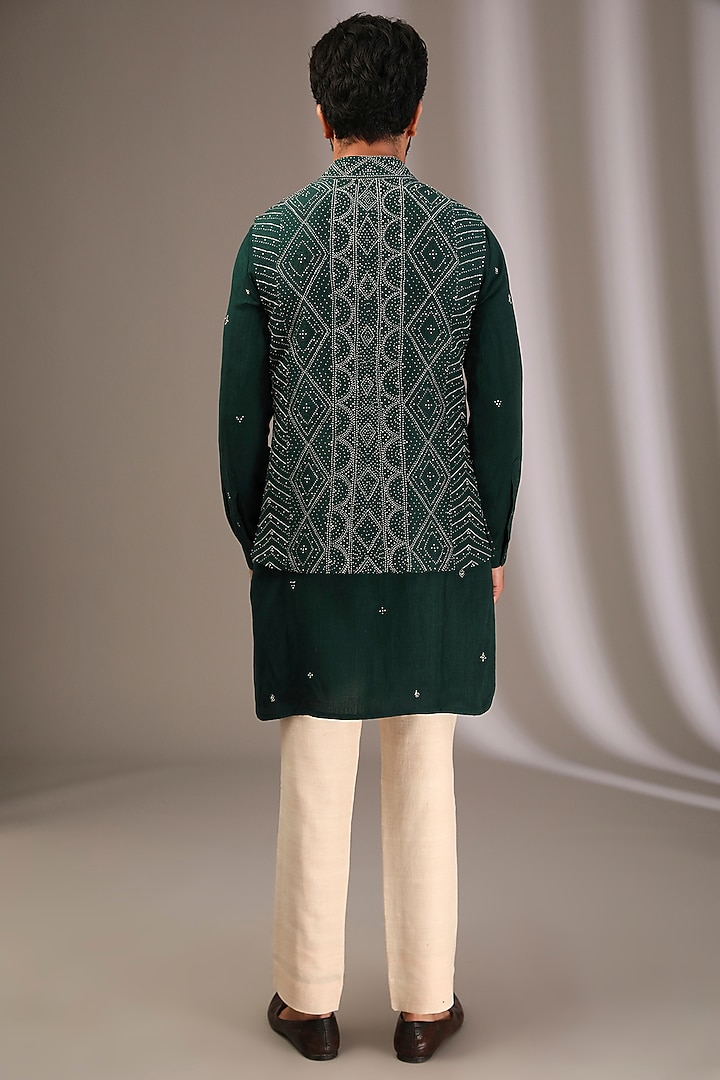 Bottle Green Raw Silk Embroidered Bundi Jacket Set by Divyam Mehta Men at Pernia's Pop Up Shop