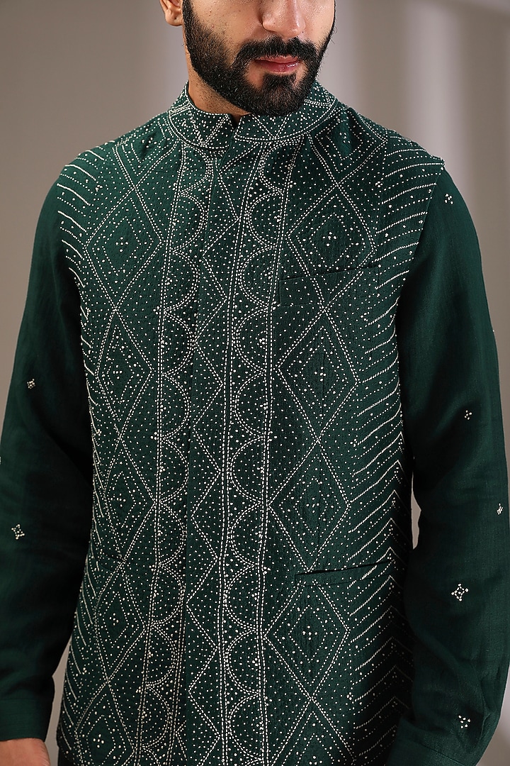 Bottle Green Raw Silk Embroidered Bundi Jacket Set by Divyam Mehta Men at Pernia's Pop Up Shop