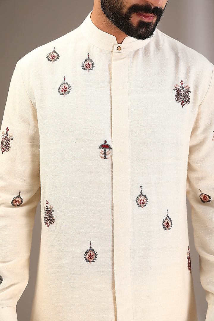Ivory Raw Silk & Katan Silk Embroidered Kurta Set by Divyam Mehta Men at Pernia's Pop Up Shop