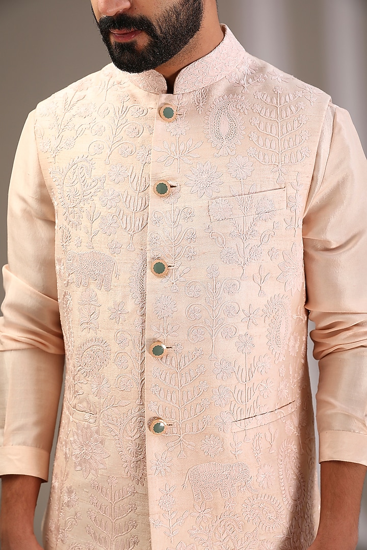 Oyster Pink Raw Silk Embroidered Bundi Jacket Set by Divyam Mehta Men at Pernia's Pop Up Shop