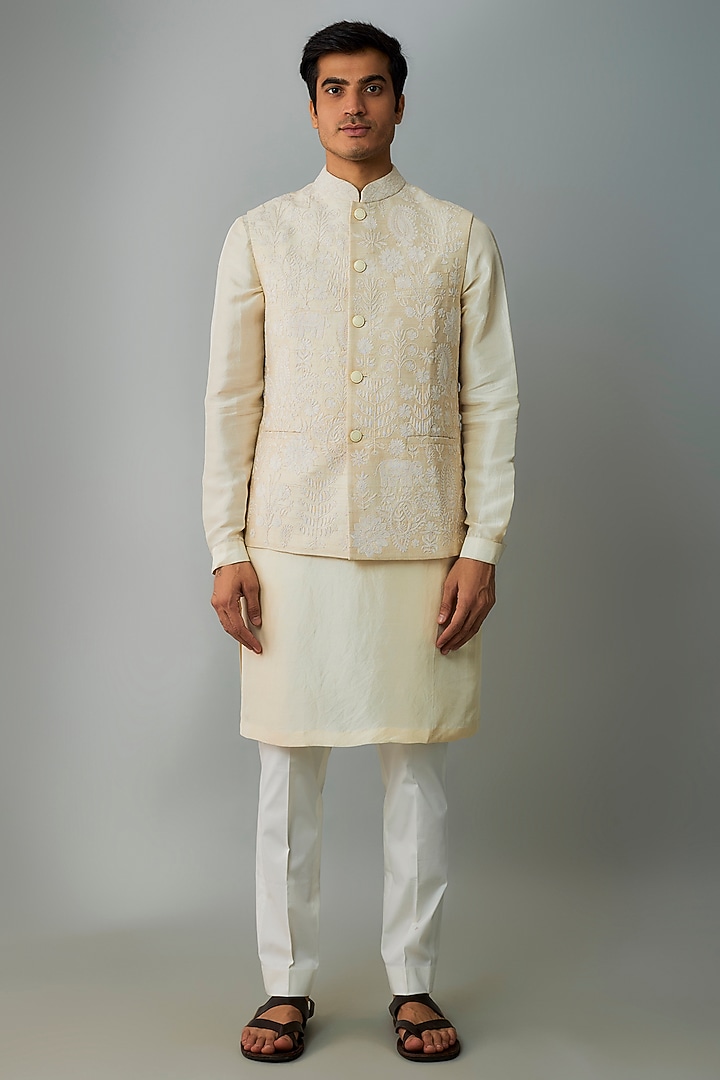 Ivory Raw Silk Embroidered Bundi Jacket Set by Divyam Mehta Men at Pernia's Pop Up Shop