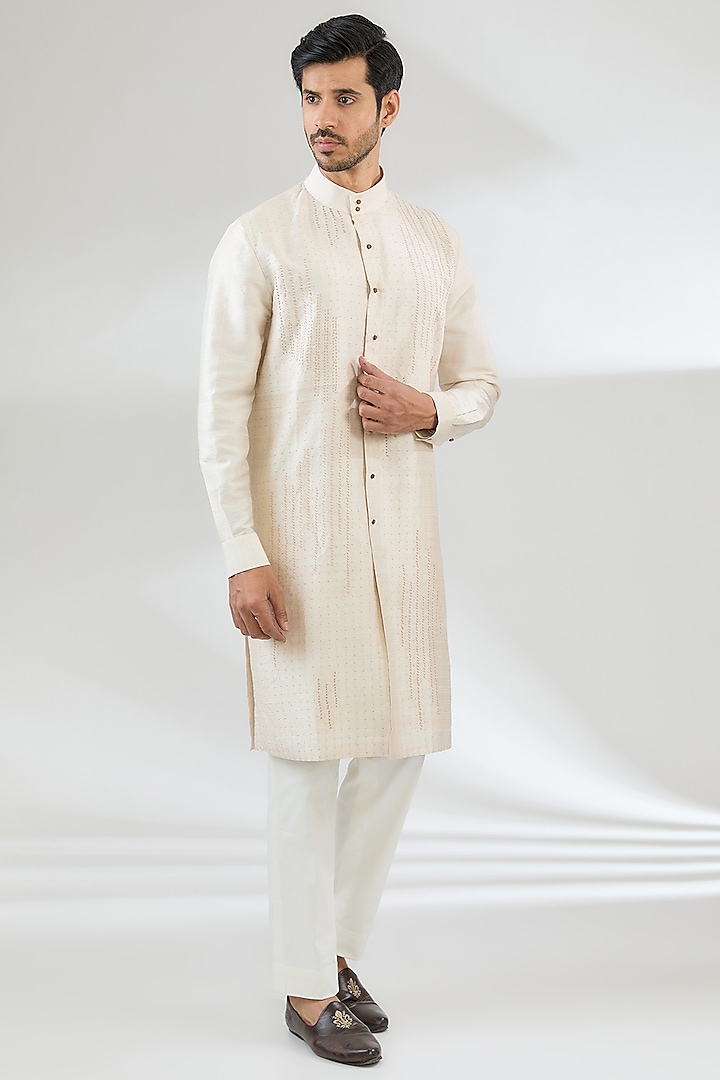 Ivory Raw Silk Kurta Set by Divyam Mehta Men at Pernia's Pop Up Shop