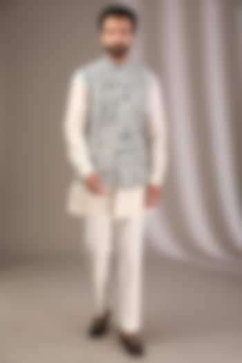 Ivory Raw Silk Bundi Jacket Set by Divyam Mehta Men at Pernia's Pop Up Shop