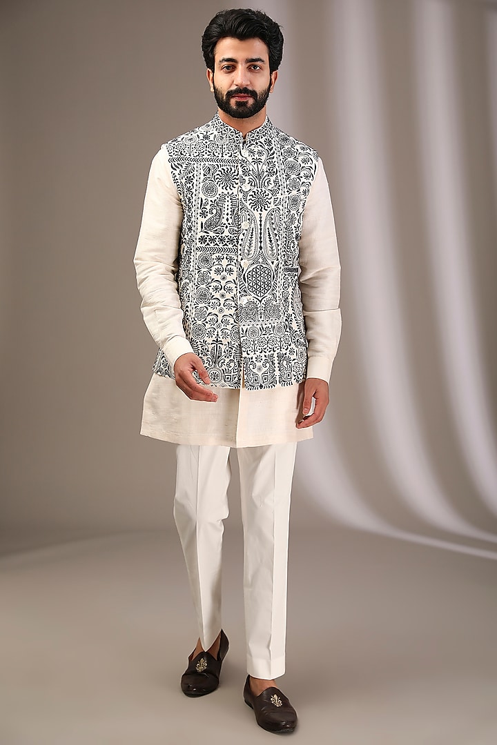 Ivory Raw Silk Bundi Jacket Set by Divyam Mehta Men at Pernia's Pop Up Shop