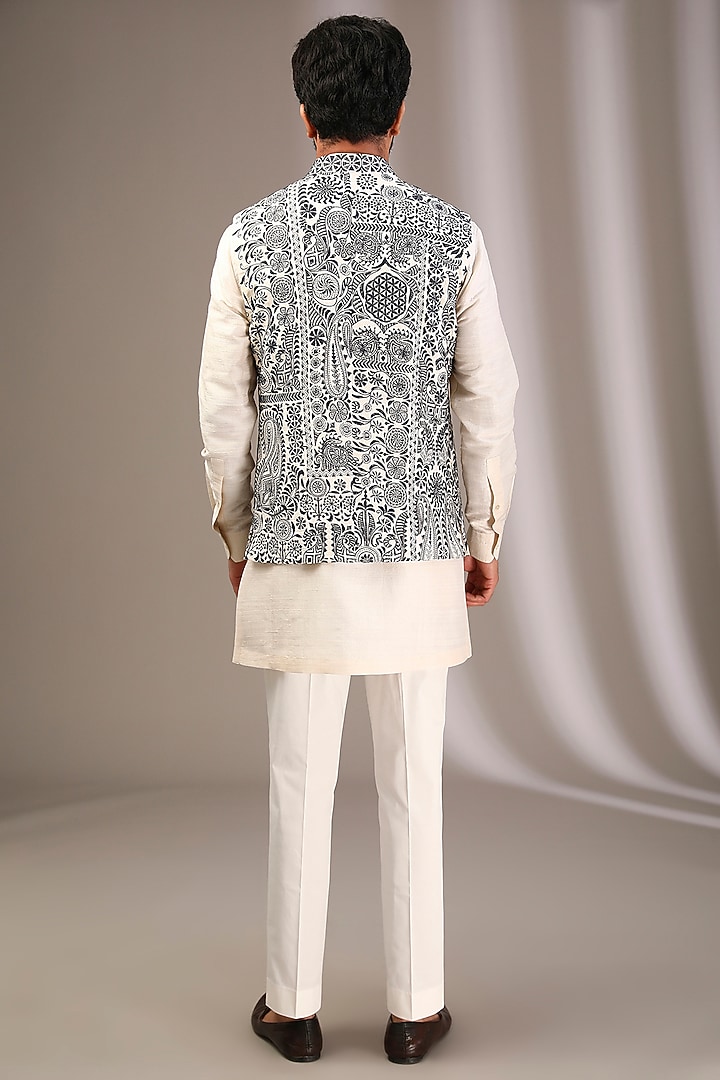 Ivory Raw Silk Bundi Jacket Set by Divyam Mehta Men at Pernia's Pop Up Shop
