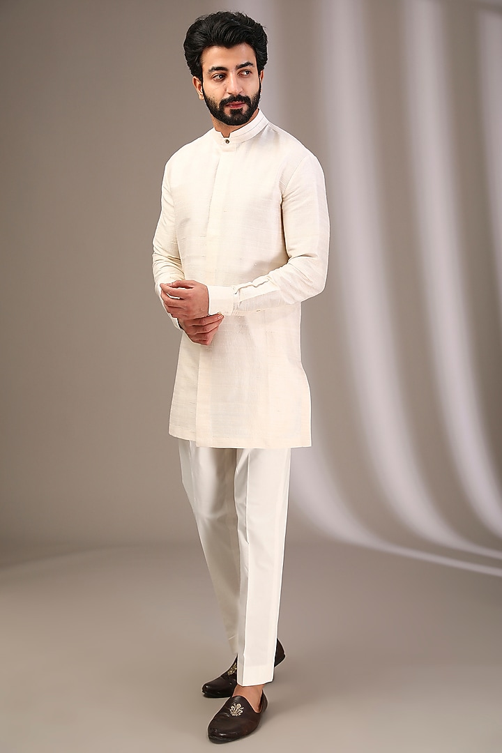 Ivory Raw Silk Bundi Jacket Set by Divyam Mehta Men at Pernia's Pop Up Shop