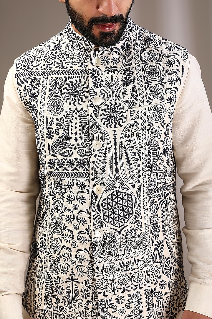 Ivory Raw Silk Bundi Jacket Set by Divyam Mehta Men at Pernia's Pop Up Shop