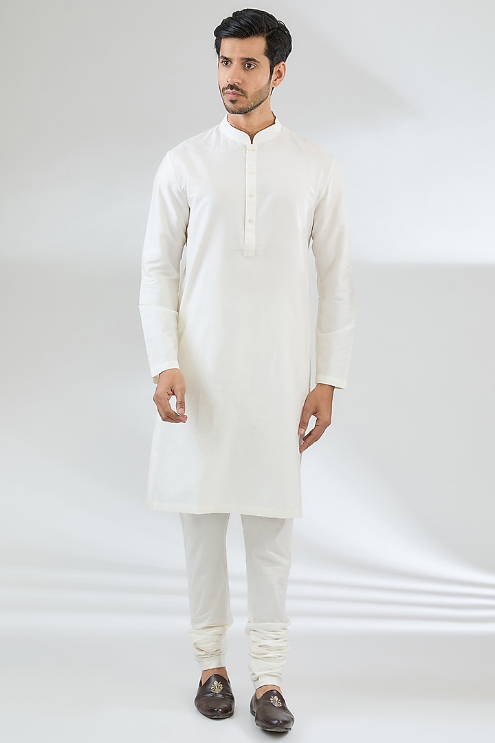 Ivory Raw Silk Groom Sherwani Set by Divyam Mehta Men at Pernia's Pop Up Shop