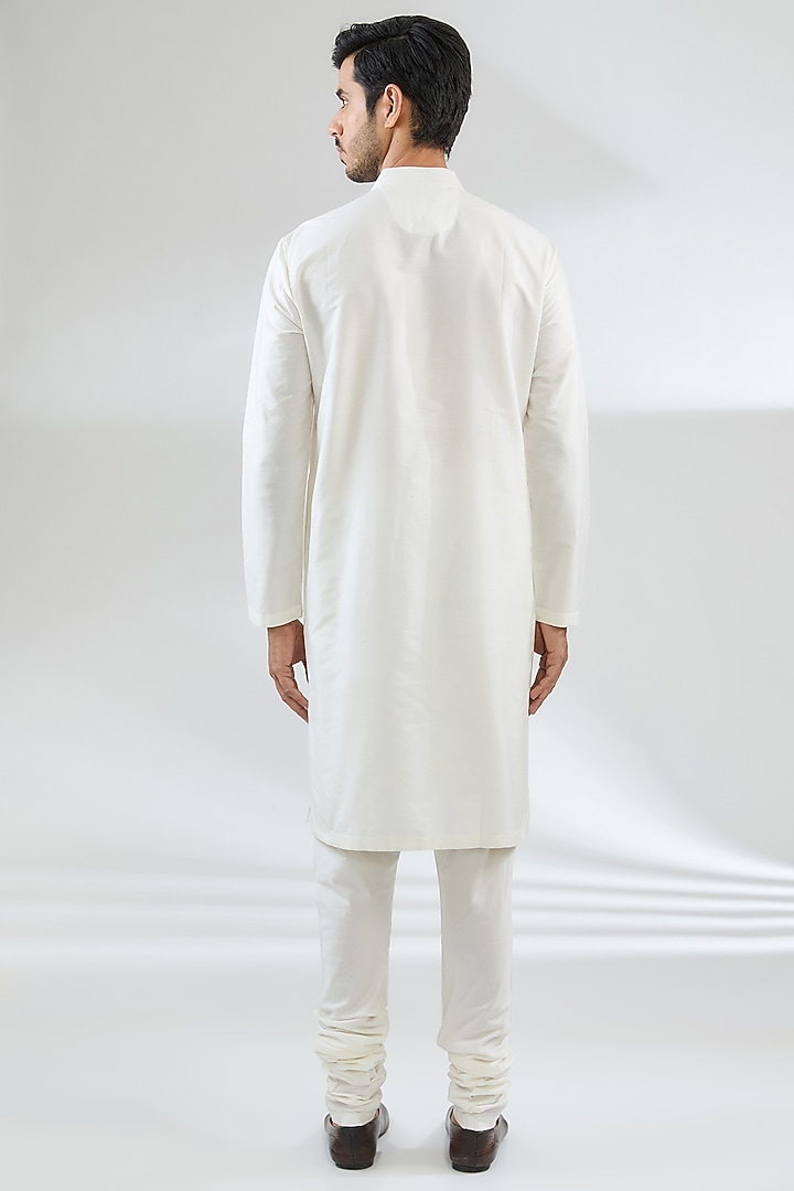 Ivory Raw Silk Groom Sherwani Set by Divyam Mehta Men at Pernia's Pop Up Shop