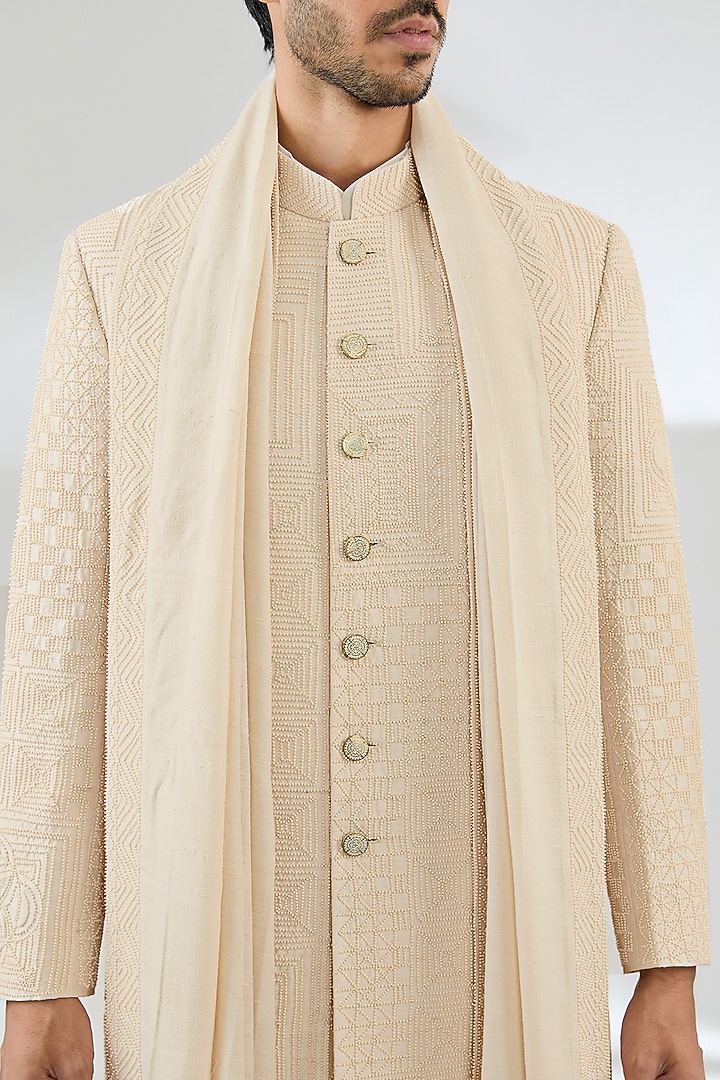 Ivory Raw Silk Groom Sherwani Set by Divyam Mehta Men at Pernia's Pop Up Shop