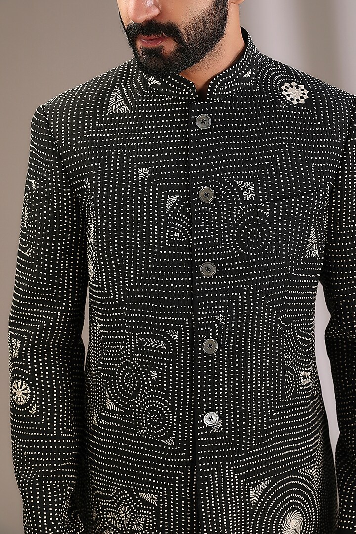 Black Raw Silk Hand Embroidered Groom Bandhgala Set by Divyam Mehta Men at Pernia's Pop Up Shop