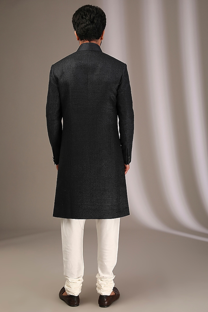 Black Raw Silk Wedding Sherwani Set by Divyam Mehta Men at Pernia's Pop Up Shop