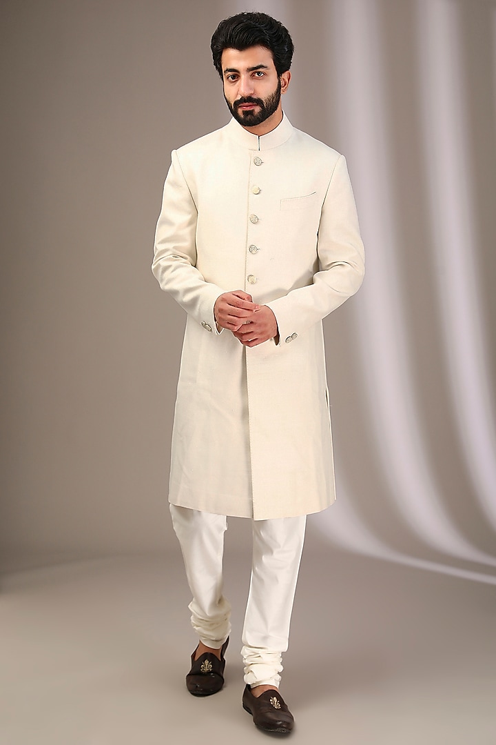 Ivory Raw Silk Sherwani Set by Divyam Mehta Men