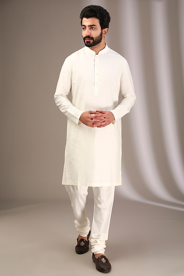 Ivory Raw Silk Wedding Sherwani Set by Divyam Mehta Men at Pernia's Pop Up Shop