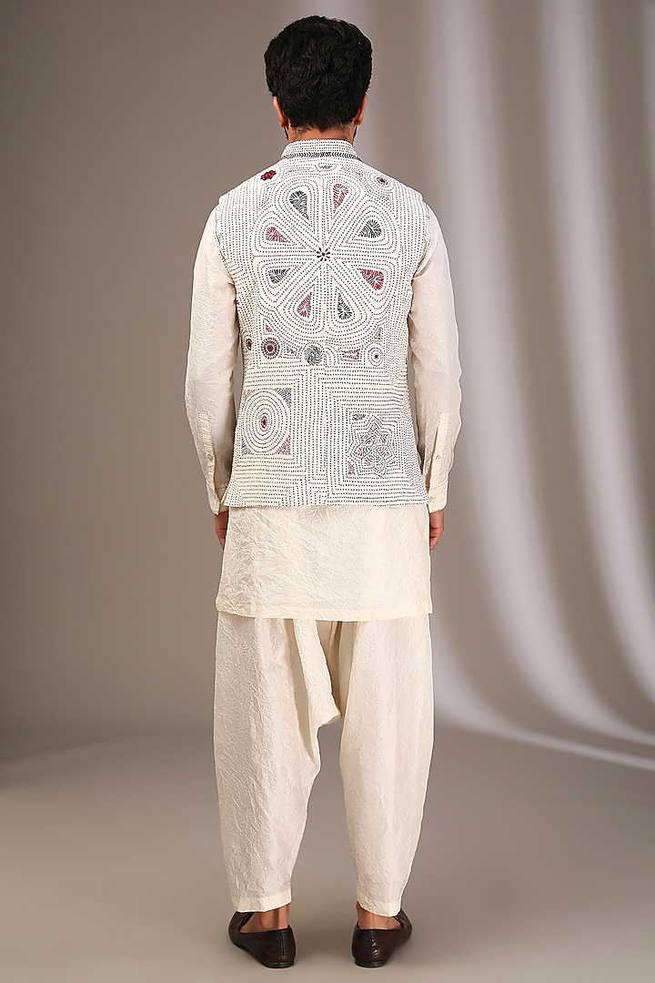 Ivory Raw Silk Bundi Jacket Set by Divyam Mehta Men at Pernia's Pop Up Shop