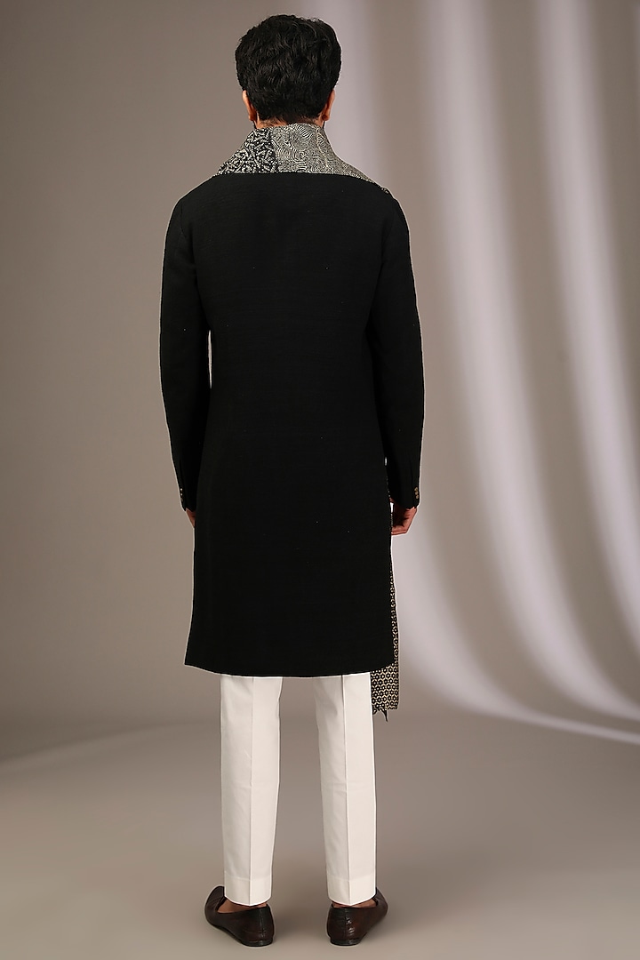 Black Raw Silk Kurta Set by Divyam Mehta Men at Pernia's Pop Up Shop