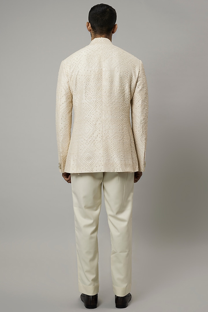 Ivory Raw Silk Groom Bandhgala Set by Divyam Mehta Men at Pernia's Pop Up Shop