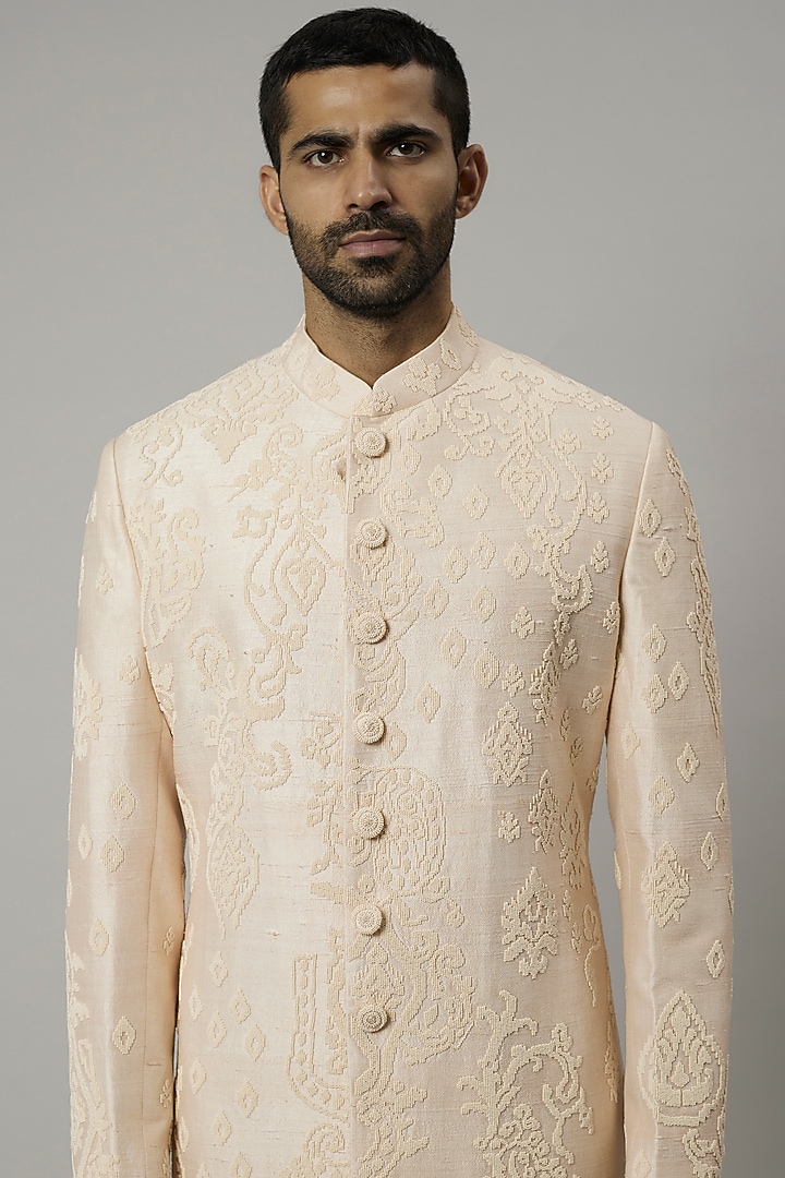 Ivory Raw Silk & Katan Silk Embroidered Groom Sherwani Set by Divyam Mehta Men at Pernia's Pop Up Shop