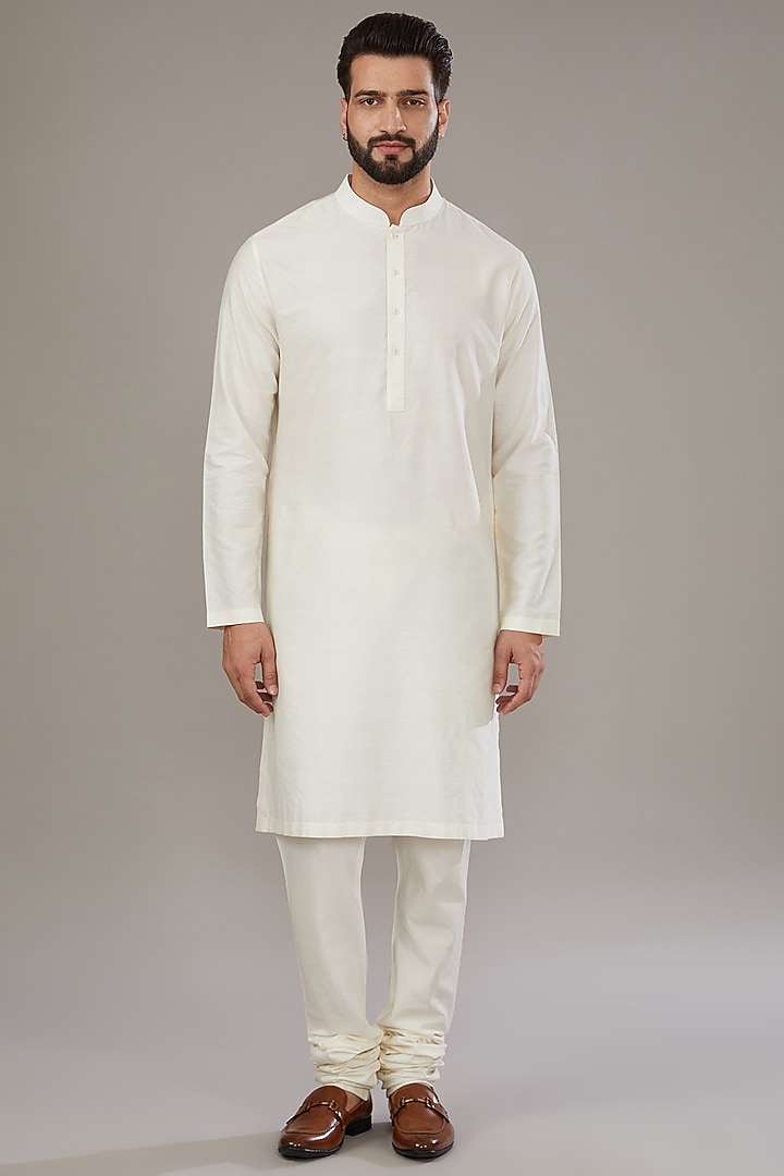 Ivory Raw Silk Groom Sherwani Set by Divyam Mehta Men at Pernia's Pop Up Shop