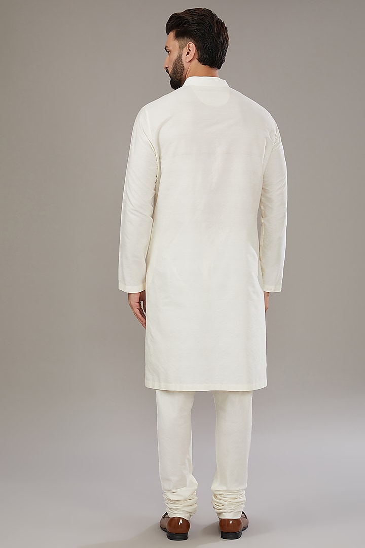 Ivory Raw Silk Groom Sherwani Set by Divyam Mehta Men at Pernia's Pop Up Shop