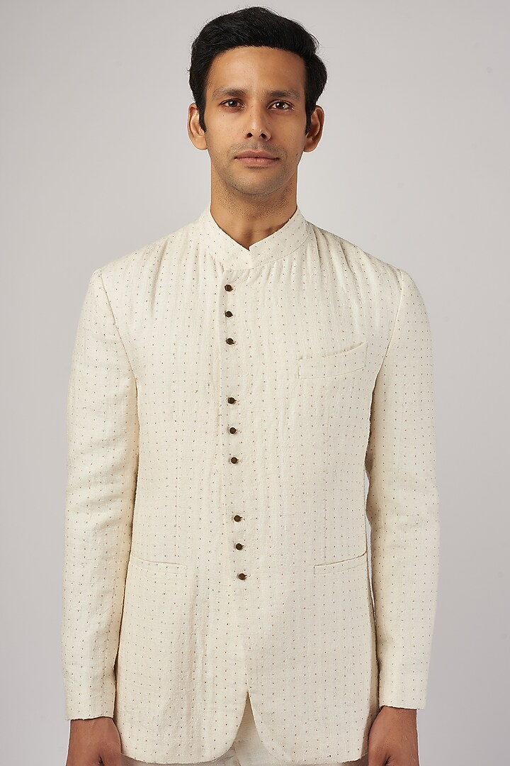 Ivory Silk Textured Groom Bandhgala Set by Divyam Mehta Men at Pernia's Pop Up Shop