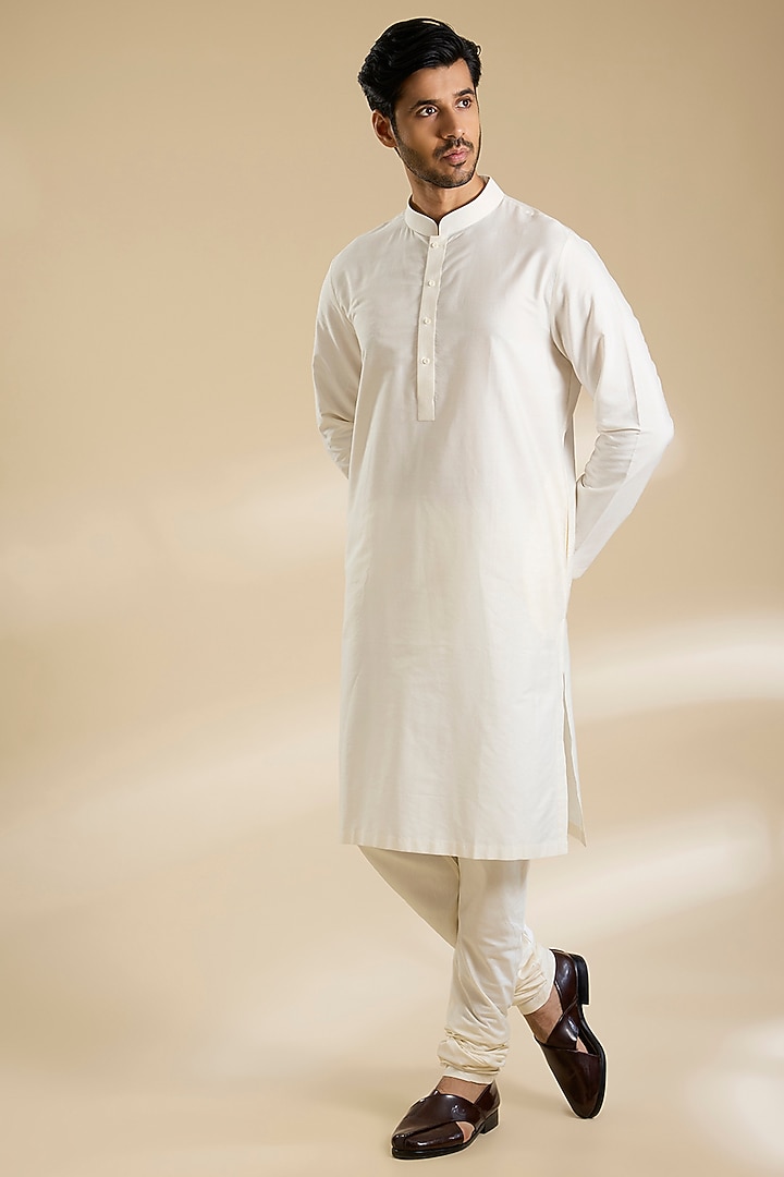 Ivory Raw Silk Groom Sherwani Set by Divyam Mehta Men at Pernia's Pop Up Shop