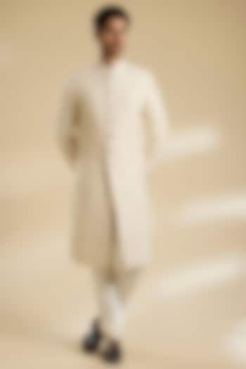Ivory Raw Silk Sherwani Set by Divyam Mehta Men