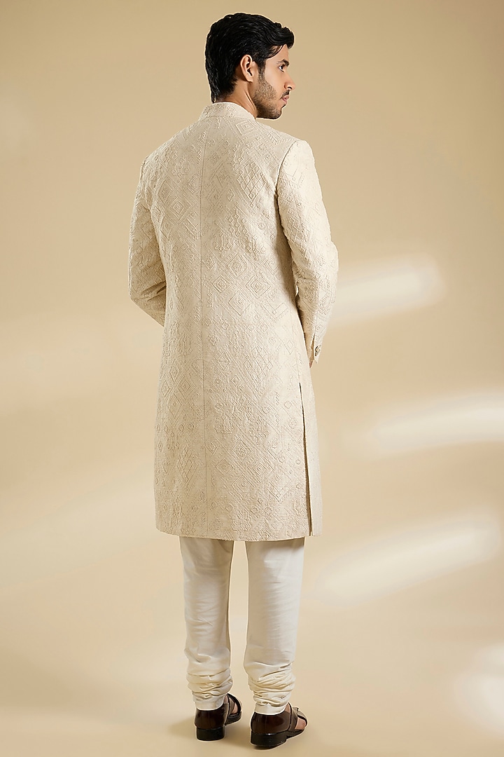 Ivory Raw Silk Groom Sherwani Set by Divyam Mehta Men at Pernia's Pop Up Shop