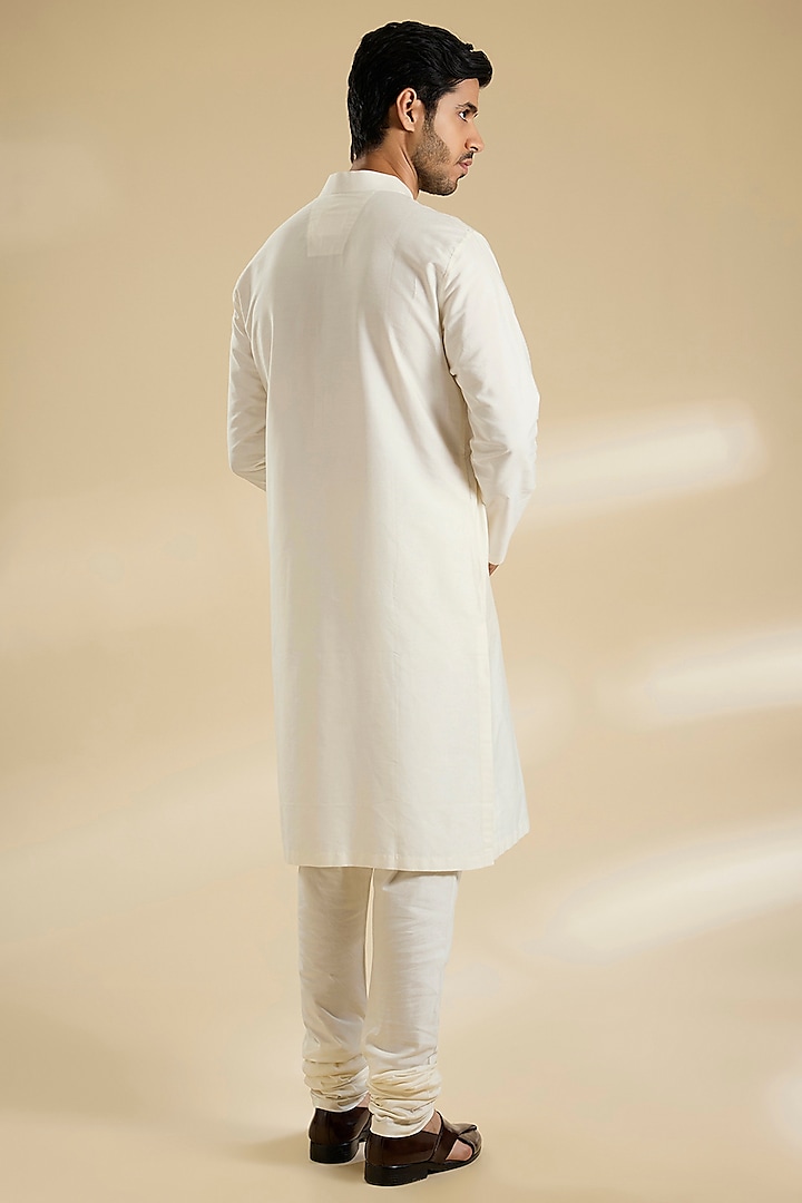 Ivory Raw Silk Groom Sherwani Set by Divyam Mehta Men at Pernia's Pop Up Shop
