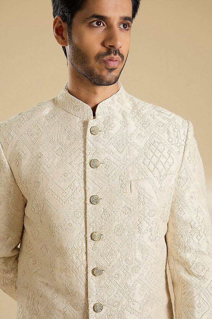 Ivory Raw Silk Groom Sherwani Set by Divyam Mehta Men at Pernia's Pop Up Shop