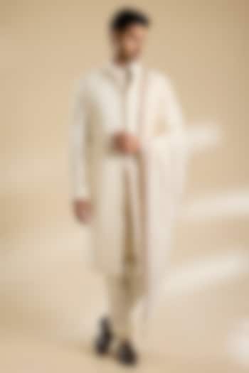 Ivory Raw Silk Sherwani Set by Divyam Mehta Men