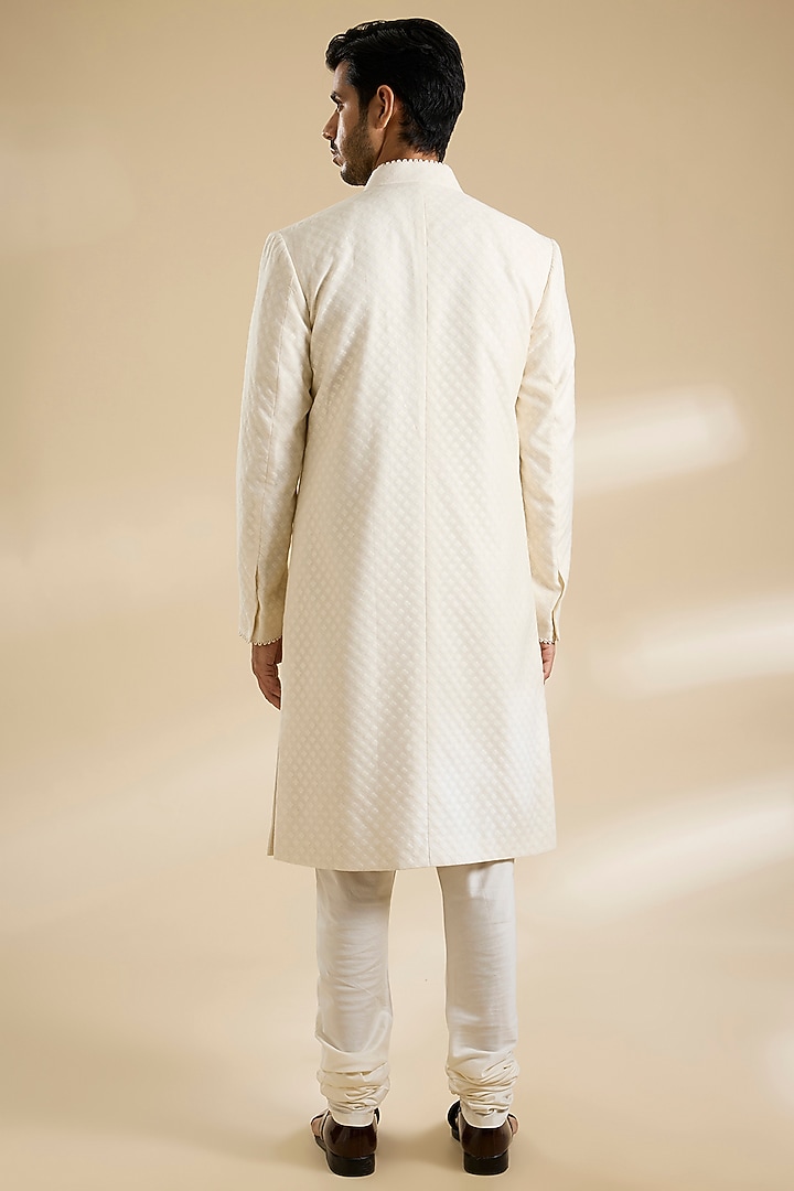 Ivory Raw Silk Groom Sherwani Set by Divyam Mehta Men at Pernia's Pop Up Shop