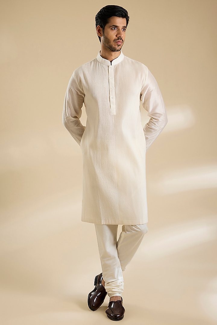 Ivory Raw Silk Groom Sherwani Set by Divyam Mehta Men at Pernia's Pop Up Shop