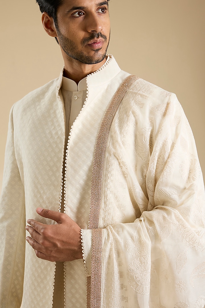 Ivory Raw Silk Groom Sherwani Set by Divyam Mehta Men at Pernia's Pop Up Shop