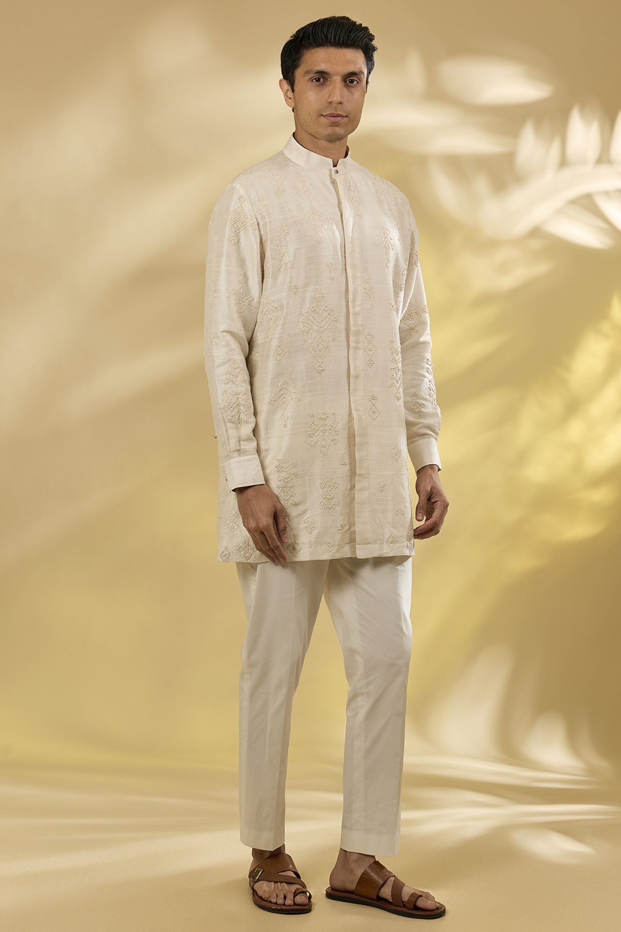 Champa Colored Raw Silk Kurta Set by Divyam Mehta Men