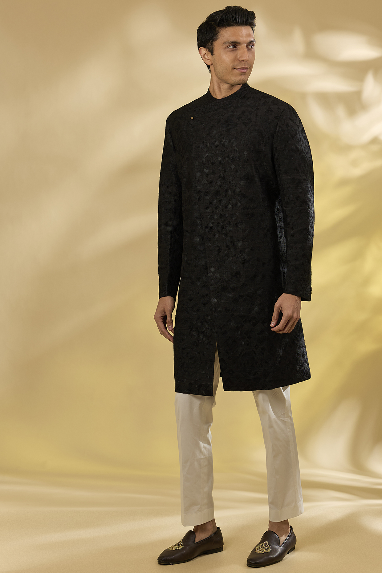 Black Raw Silk & Stretch Cotton Overlap Kurta Set by Divyam Mehta Men