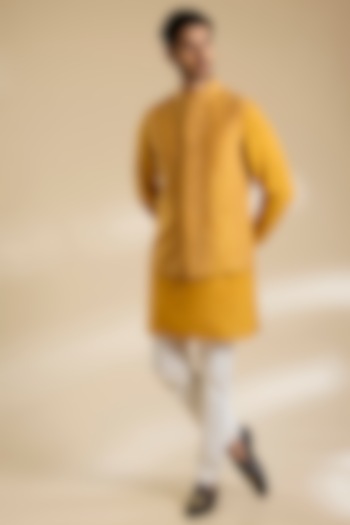 Chandan Yellow Raw Silk Thread Embroidered Bundi Jacket Set by Divyam Mehta Men