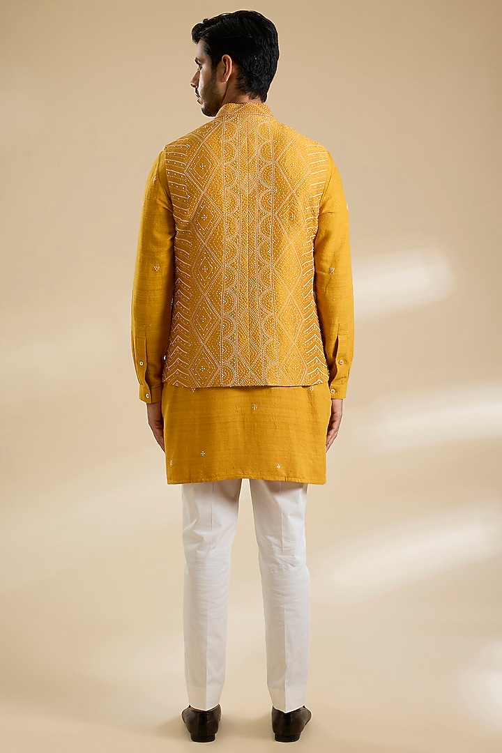 Chandan Yellow Raw Silk Thread Embroidered Bundi Jacket Set by Divyam Mehta Men at Pernia's Pop Up Shop