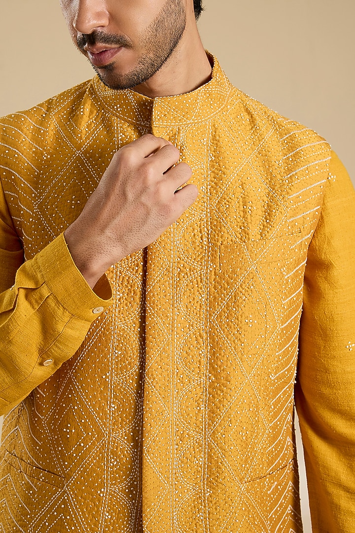 Chandan Yellow Raw Silk Thread Embroidered Bundi Jacket Set by Divyam Mehta Men at Pernia's Pop Up Shop