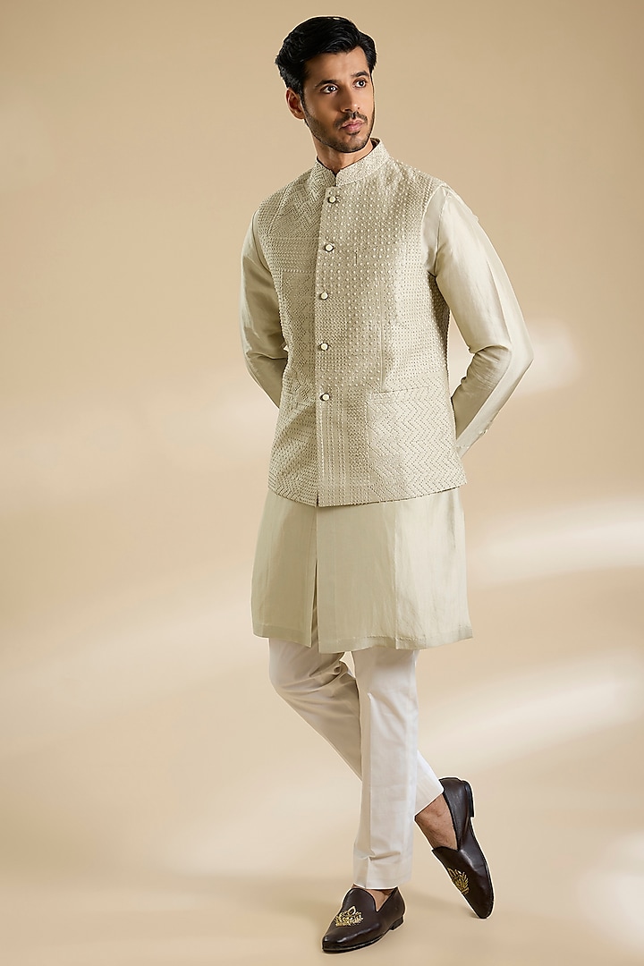 Saunf Green Raw Silk French Knot Embroidered Bundi Jacket Set by Divyam Mehta Men