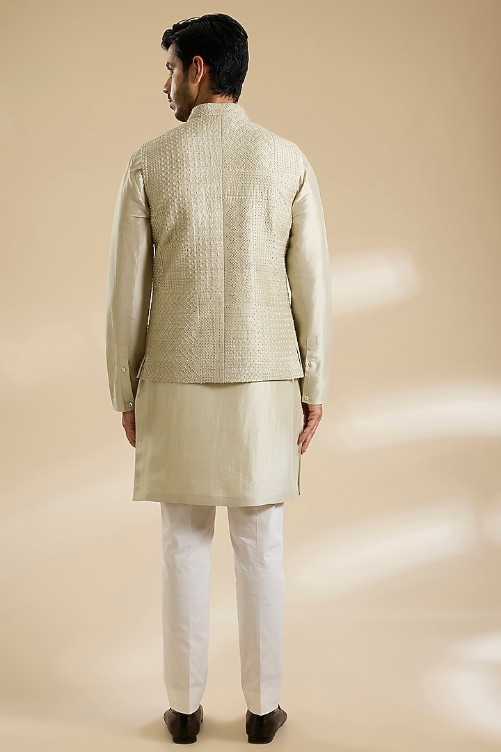 Saunf Green Raw Silk French Knot Embroidered Bundi Jacket Set by Divyam Mehta Men at Pernia's Pop Up Shop