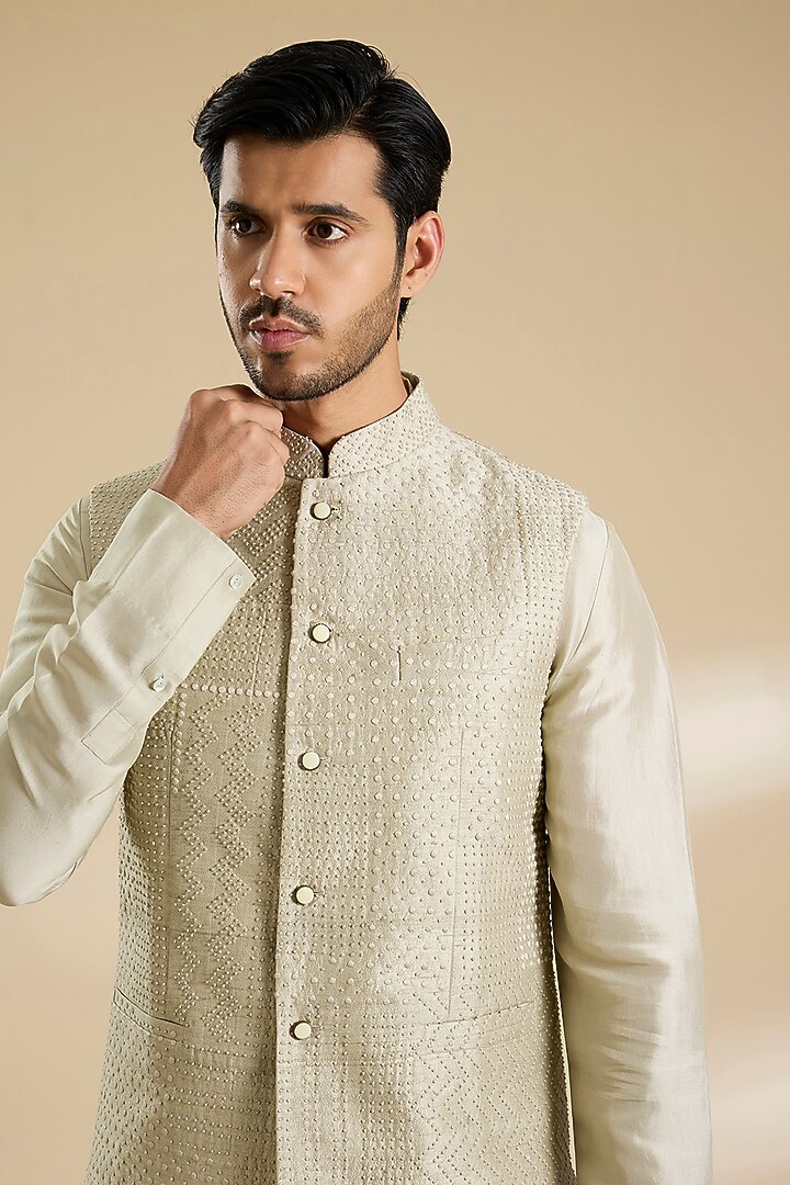 Saunf Green Raw Silk French Knot Embroidered Bundi Jacket Set by Divyam Mehta Men at Pernia's Pop Up Shop